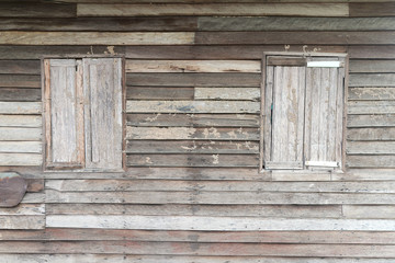Old wood wall with window for background.