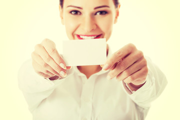 Beautiful business woman holding personal card.