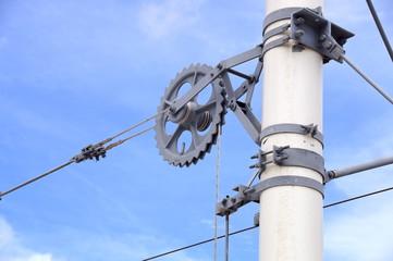 Overhead line of railway tracks keeping tension