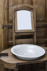 Old Washbasing and Mirror.