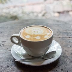 latte coffee on wood table