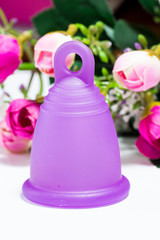 Menstrual cup and roses