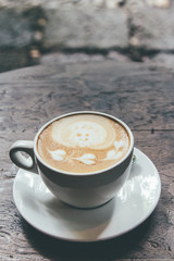 latte coffee on wood table