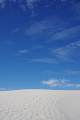 Fototapeta na wymiar white sands and blue sky