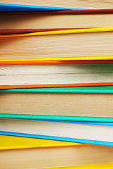 Background from multi-coloured books.