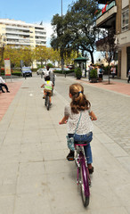 Family bike ride, Seville, Spain