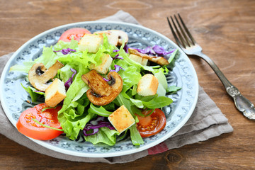 appetizing salad with greens and mushrooms