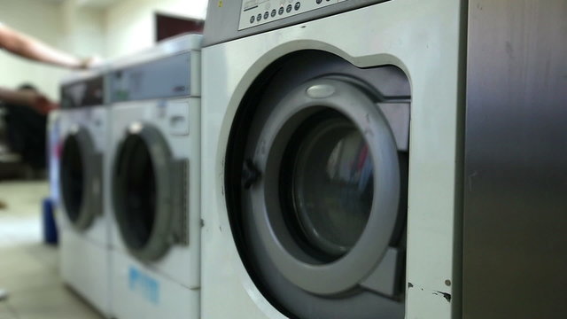 Washing machines in laundry room, close-up