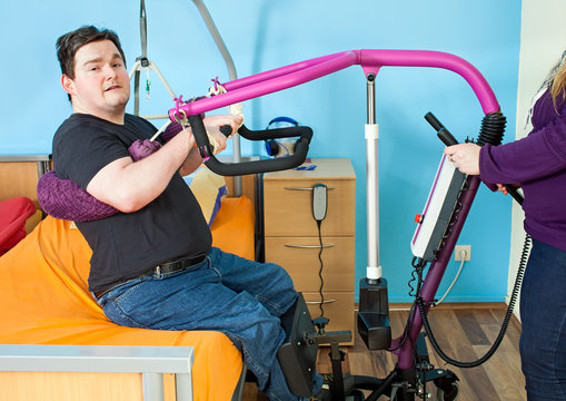 Young man with infantile cerebral palsy.