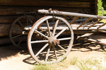 Fototapeta na wymiar Vintage old rough wooden cart