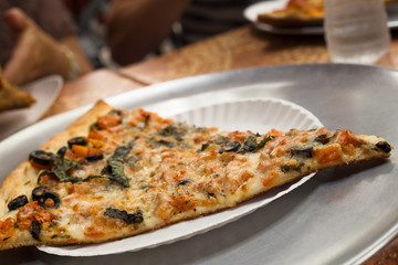 Slice of traditional New York Style pizza