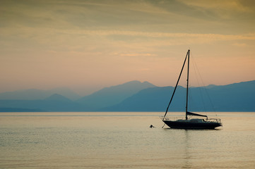 Single boat at Garda lake, Italy