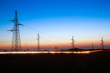 Electrical powerlines at dusk - 69645409