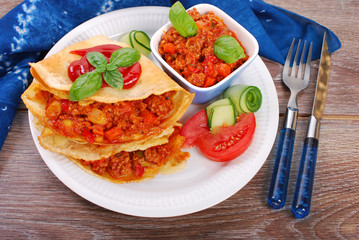 pancakes filled with minced meat and vegetables