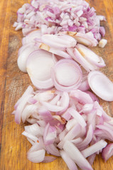 Chopped onions on a chopping board