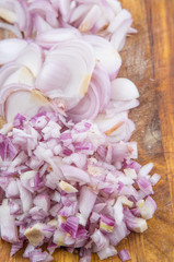 Obraz na płótnie Canvas Chopped onions on a chopping board