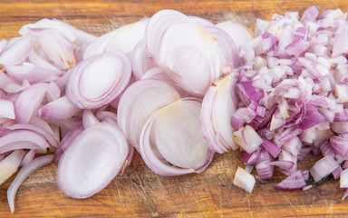 Chopped onions on a chopping board