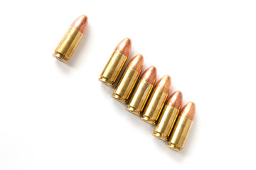 9mm bullet for a gun isolated on white background.