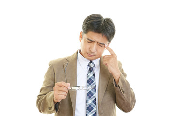 頭痛を訴える男性