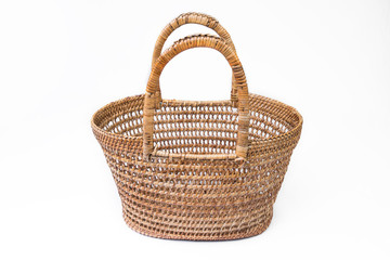 Fototapeta premium empty wicker basket isolated on white background
