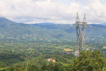 Obraz premium High voltage towers on mountain