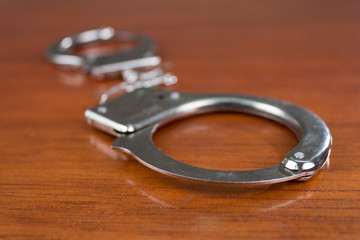 Closeup shot of metallic handcuffs