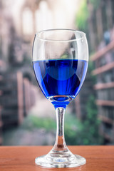 glass with blue liquor