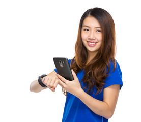 Fototapeta premium Woman use wearable watch and smartphone