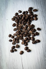 coffee beans on wooden background
