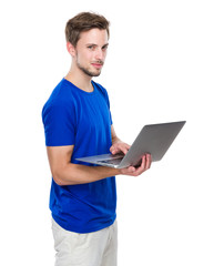 Caucasian man use of notebook computer