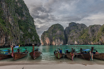 Fototapeta na wymiar Longboats on May a Beach Thailand