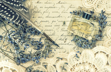 antique ink pen, perfume, old love letters and lavender flowers