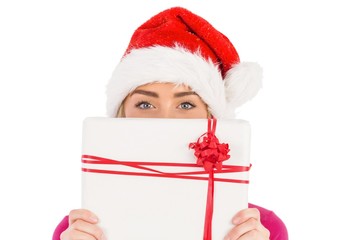 Festive blonde holding christmas gift