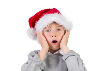 Child wearing a santa hat