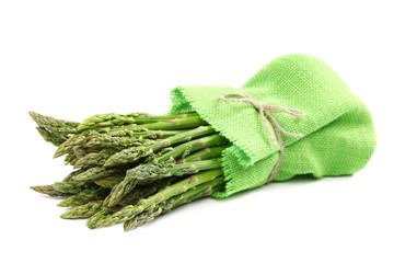Fresh green asparagus on a white background.