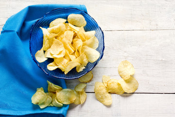 potato chips inside blue bowl