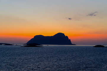 Naklejka na ściany i meble Sunset in norwegian fiords horizontal