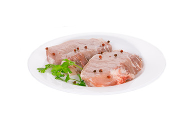 Raw meat on a plate.