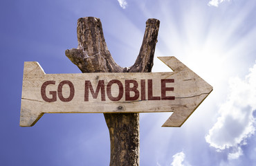 Go Mobile wooden sign on a beautiful day