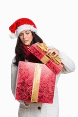 Shocked woman opening christmas present