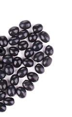 Half heart shape of black olives.