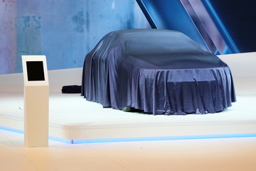 The image of cars in a showroom