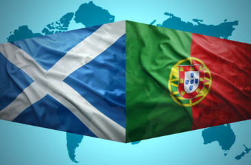 Waving Scottish and Portuguese flags