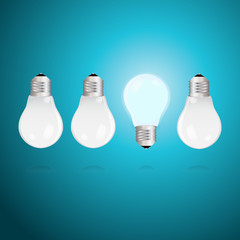 Idea concept with light bulbs on a blue background