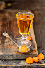 cloudberry liqueur with berries