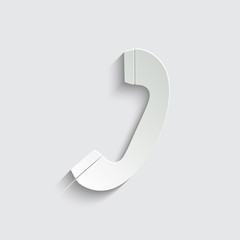 Telephone receiver icon with shadow on a grey background