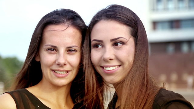 Portrait of young girls sisters.