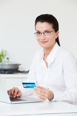 Woman Making Online Purchase At Home