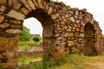 Fototapeta premium Ruins fragment of Tughlaqabad Fort in Delhi India