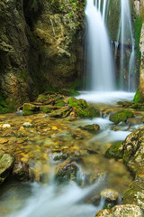 Deep forest waterfalls in the Transylvanian Alps